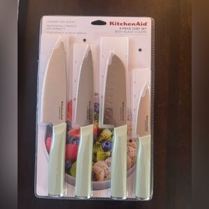 KitchenAid 4-piece chef knife set with blade covers.